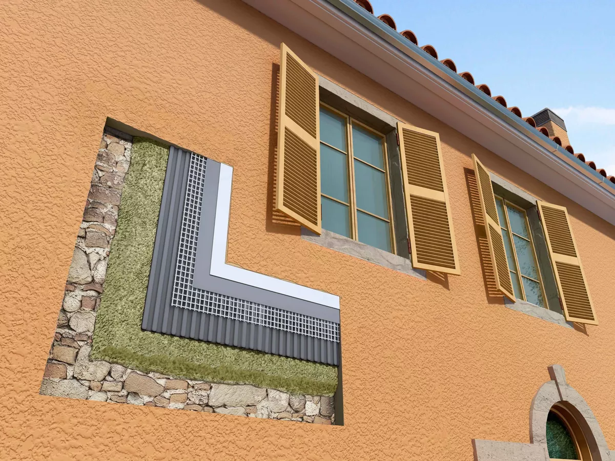 Cutaway of the EIFS build-up showing substrate, insulation, mesh, basecoat and render layers